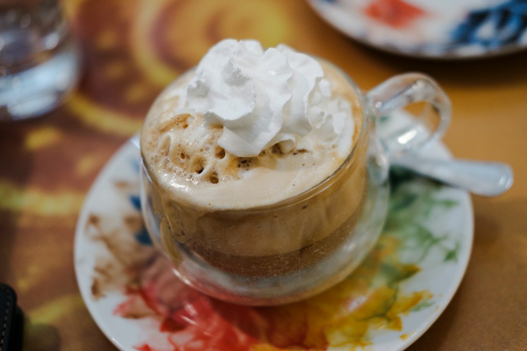 Coffee drink topped with whipped cream