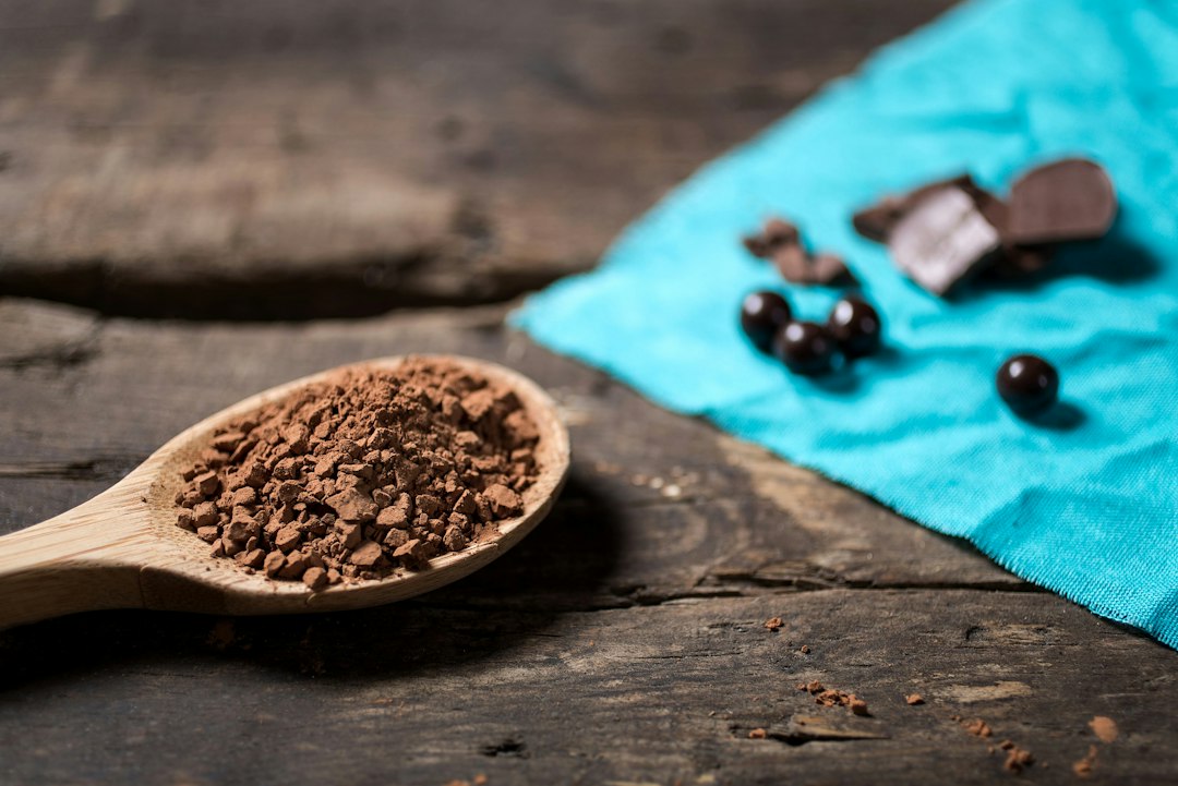 Wooden spoon with cocoa powder