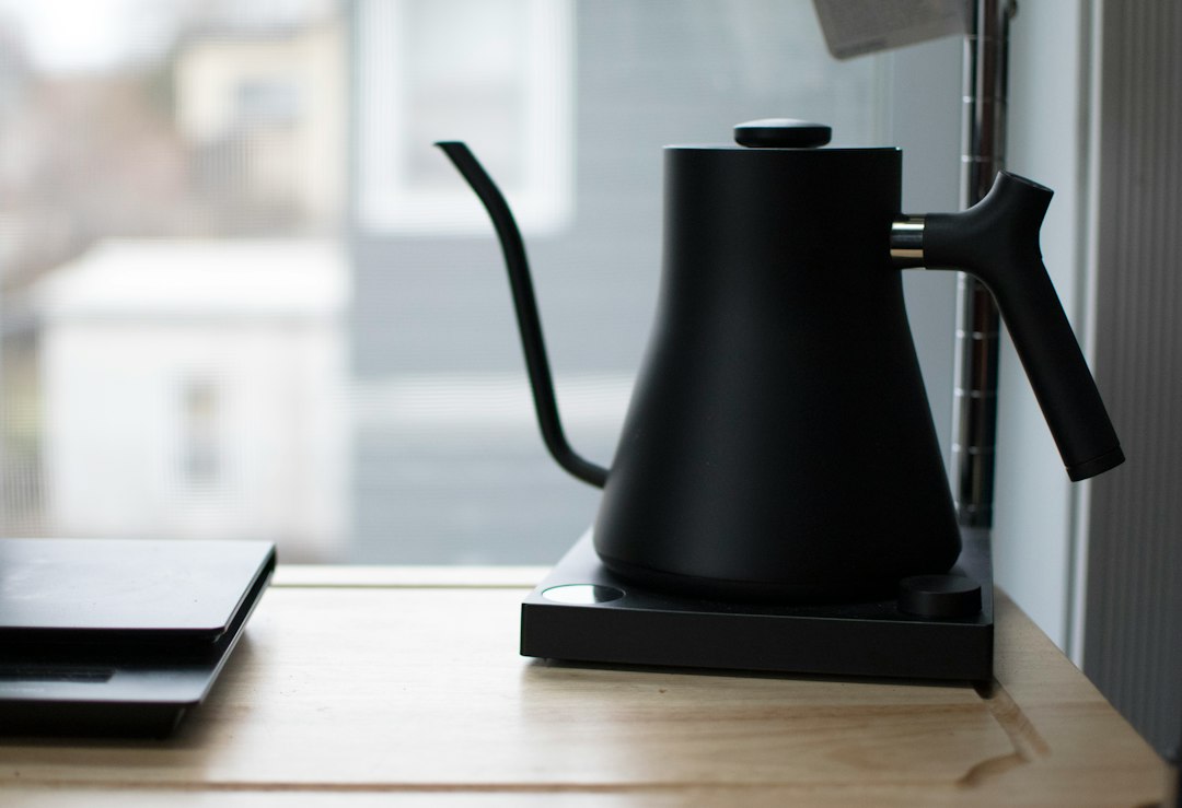 Gooseneck kettle next to coffee scales