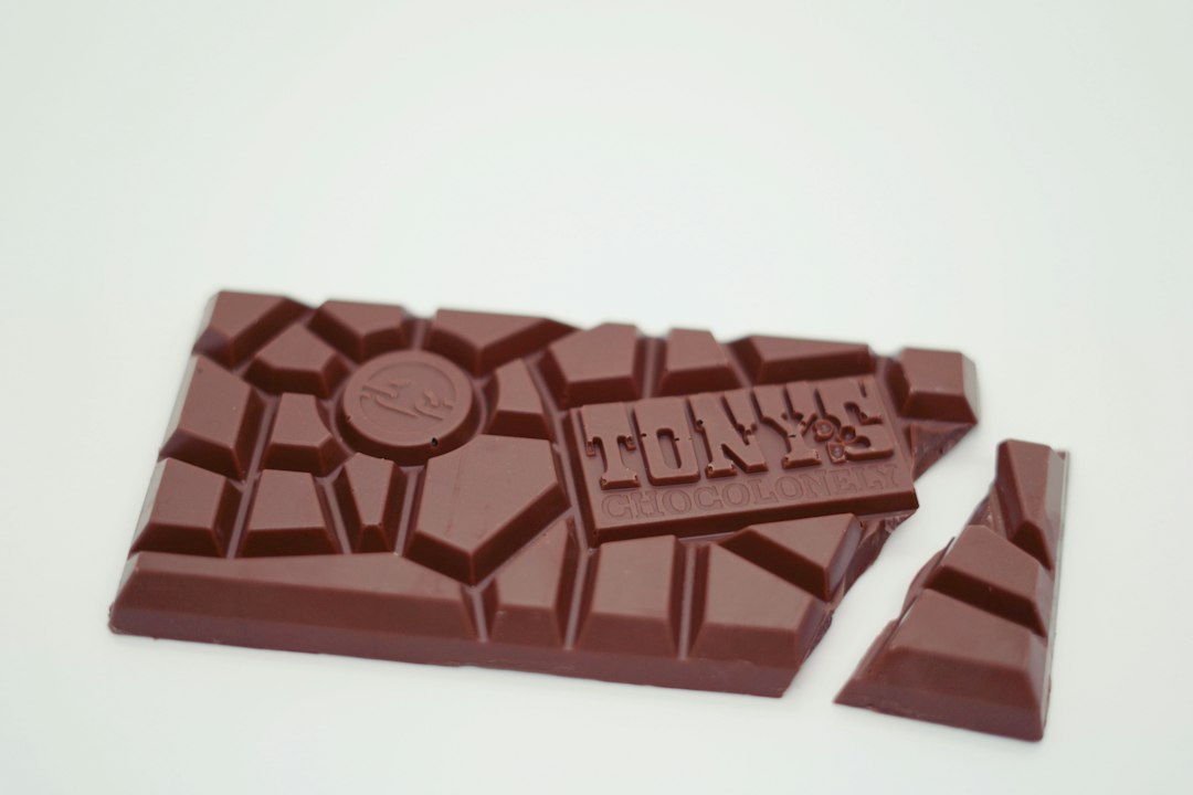Two pieces of chocolate lying on top of each other